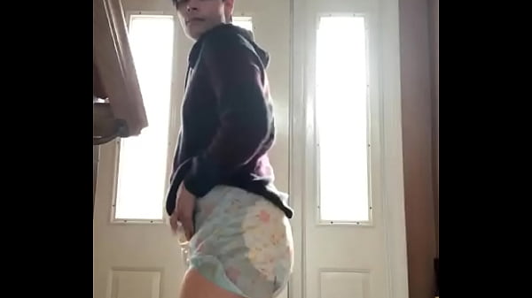 Diaper Boy Showing Off His Wet Diaper