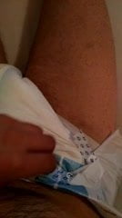Disabled incontinent with diaper jerking off