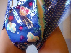ABDL boy changing in fresh diaper and peeing in it